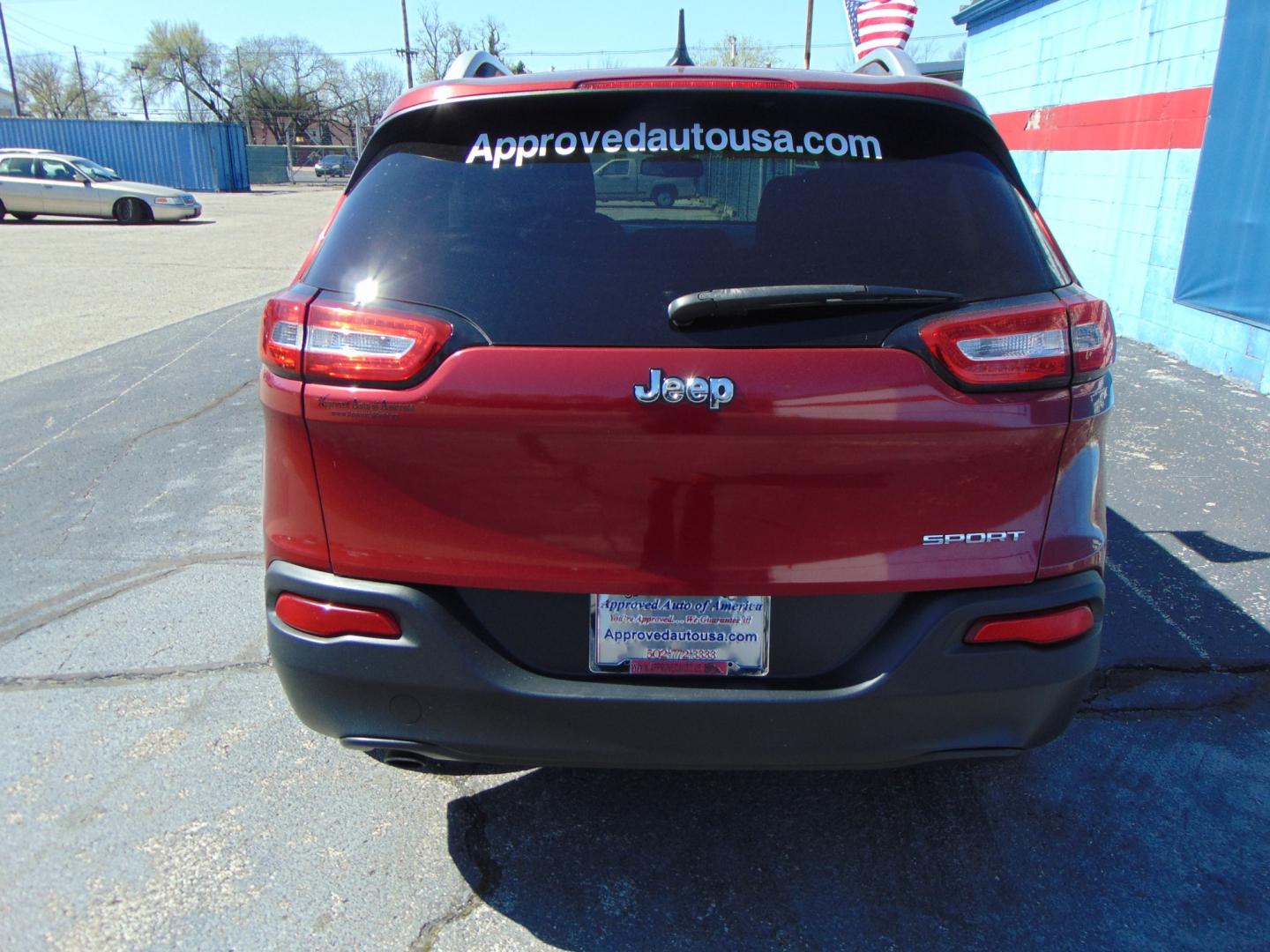 2015 Red Jeep Cherokee (1C4PJLAB2FW) with an 4-Cyl 2.4 Liter engine, Automatic, 9-Spd transmission, located at 2105 Dixie Hwy, Louisville, KY, 40210, (502) 772-3333, 38.220932, -85.795441 - Photo#12